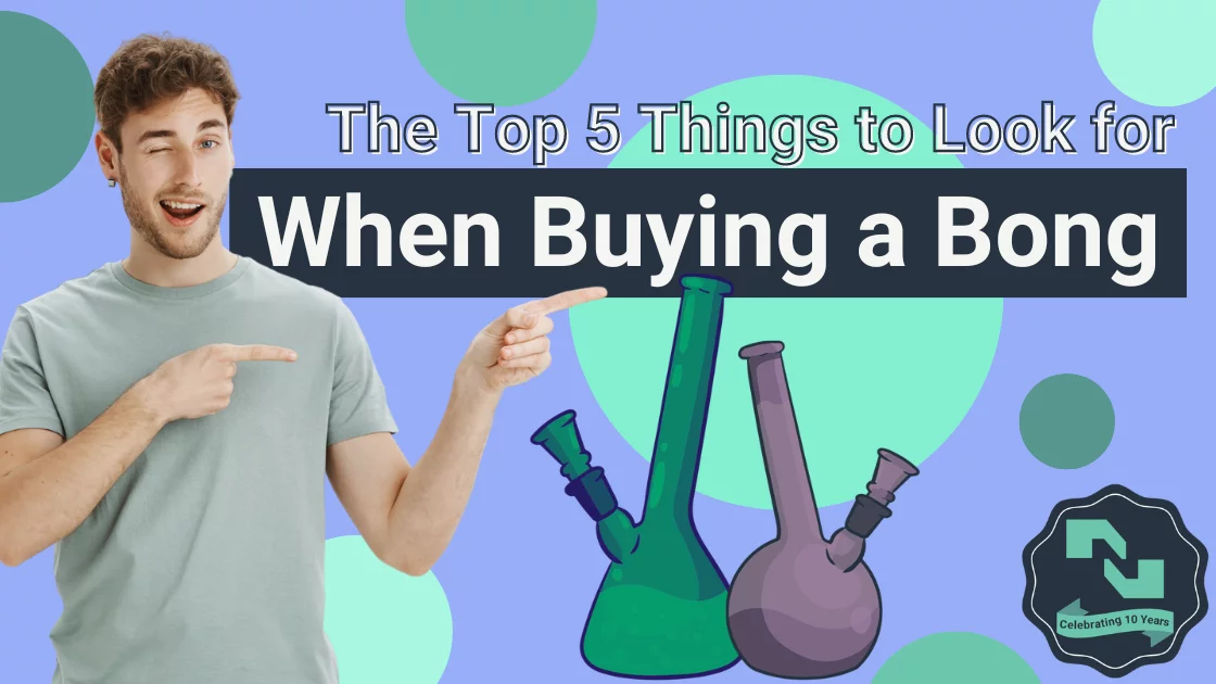 The text, 'The Top 5 Things to Look for When Buying a Bong' appears to the right of a brunette man in a gray shirt, winking and pointing to the words with both hands. Below the words are green and purple illustrated bongs. The background is periwinkle blue with dots of green in varying shapes and sizes sprinkled across it